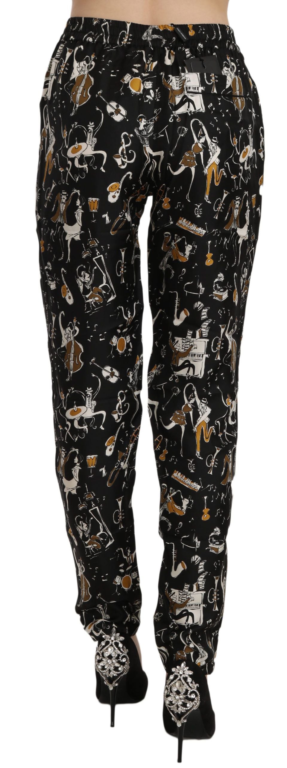 Dolce &amp; Gabbana – Schwarze, schmal zulaufende Hose mit „Jazz Club“-Print und hoher Taille