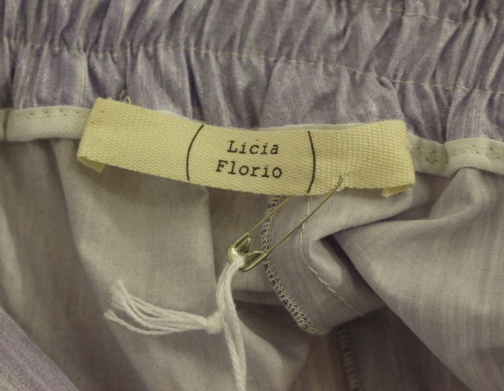 Licia Florio Lila Wickelshorts über dem Knie