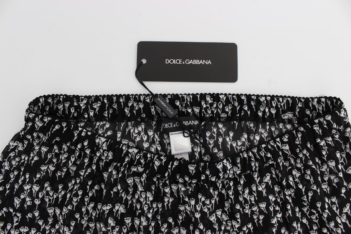 Dolce &amp; Gabbana Schwarz-weiße Nachtwäsche-Shorts aus Seide mit floraler Spitze