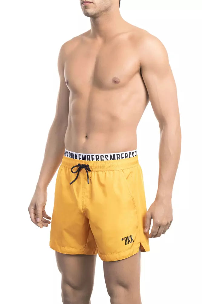 Bikkembergs leuchtend orangefarbene Badeshorts mit Markenband