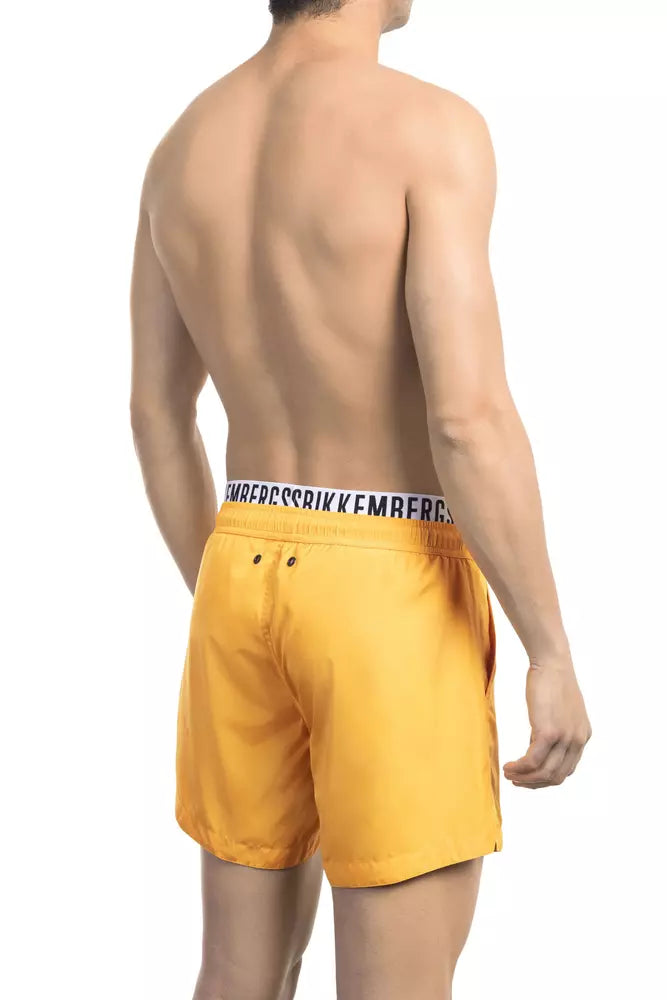 Bikkembergs leuchtend orangefarbene Badeshorts mit Markenband