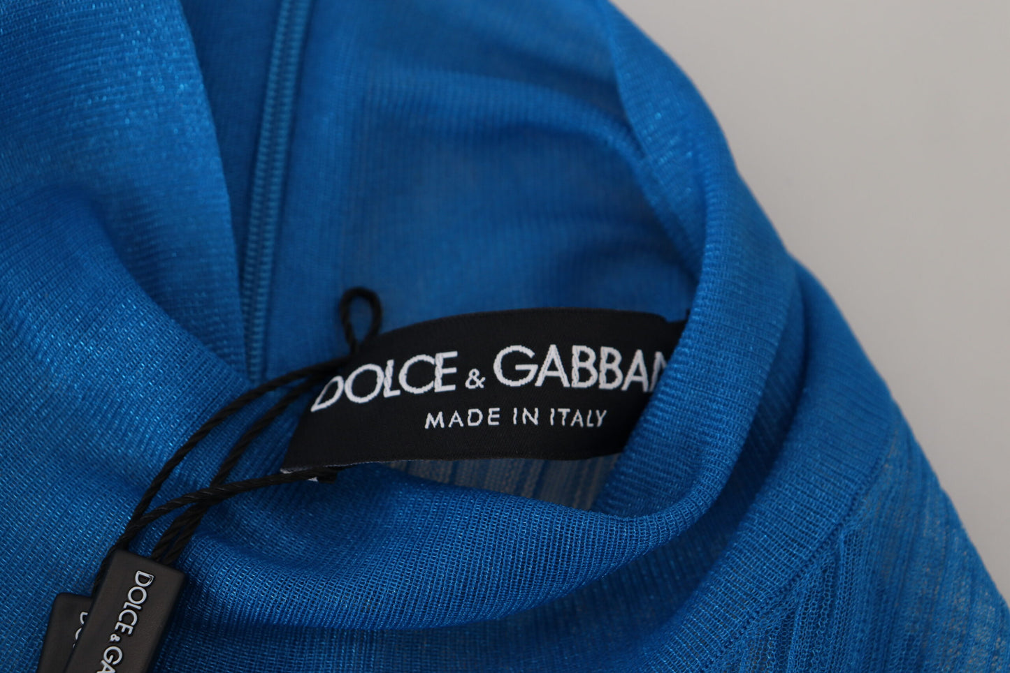 Dolce &amp; Gabbana Blaues Langarm-Blusenoberteil mit Rollkragen und Netzstoff