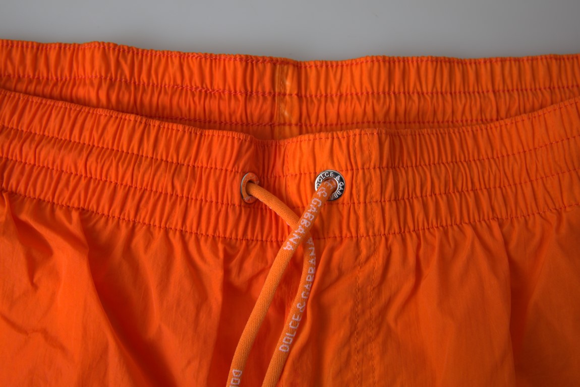 Dolce &amp; Gabbana Beachwear-Badeshorts mit Farbverlauf in Orange und Blau